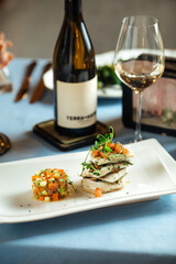 Spanish dish basque dorada with vegetable tartare