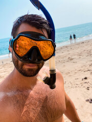 Man Snorkeling at the Beach