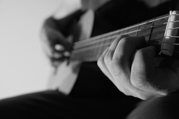 Guitar player with classic guitars. Chord, instrument.Musician with a guitar. Hands and guitar...