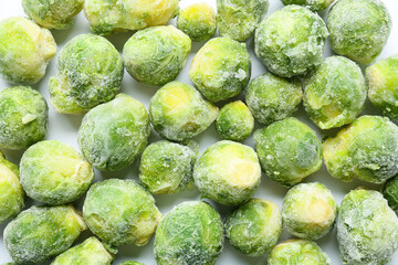 Frozen Brussels sprouts as background