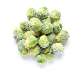 Frozen Brussels sprouts on white background