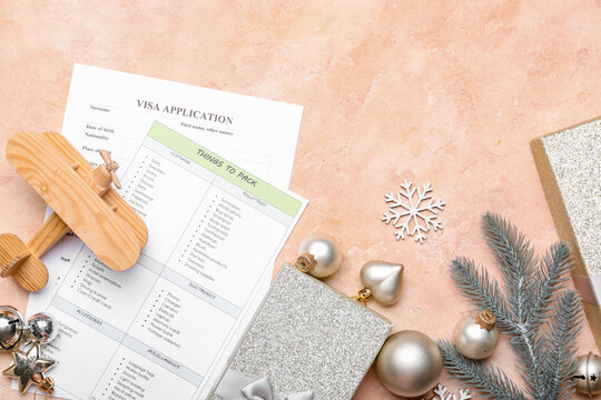 Composition with Christmas decor, airplane, checklist and visa application form on color background