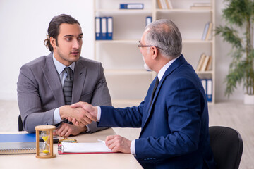 Two businessmen in time management concept