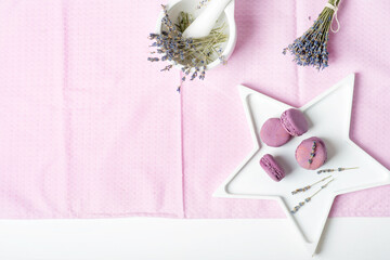 macaroons with lavender on a white table