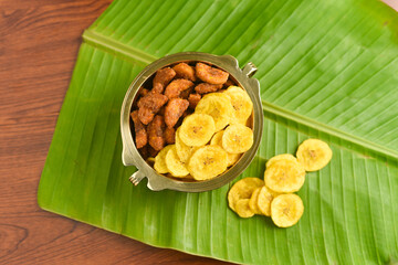 Kerala banana chips for Onam festival popular deep fried snack traditional South Indian tea time snack on banana leaf, Kerala India. fried in coconut oil on Onam, Vishu, Diwali/Deepawali, Ramzan, Eid.