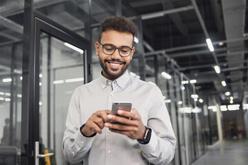 Man professional using smartphone in office. Businessman working, texting mobile phone....