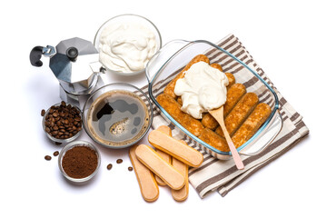 tiramisu dessert cooking - Traditional Italian Savoiardi ladyfingers Biscuits and cream in glass baking dish isolated on white with clipping path
