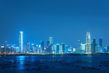 Skyline of Shenzhen city, China at night. Viewed from Hong Kong border