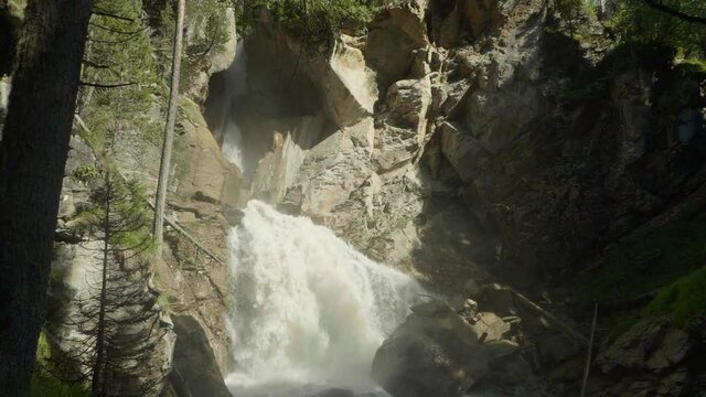 View of great waterfall in clove Mahar in Caucasus Russia. Picturesque place in mountain area.