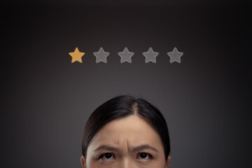 Sad Asian woman and star icon hologram effect.