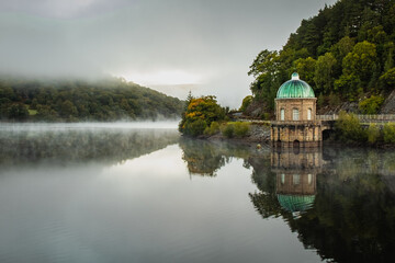 Elan valley in Mid Wales in the morning mist at sunrise.