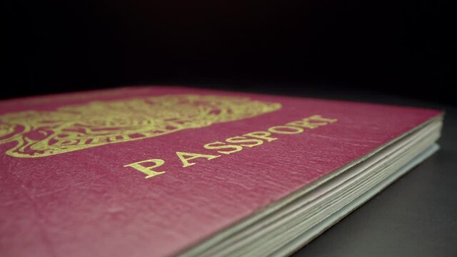 Motorized moving shot of British passport, shot with macro probe lens