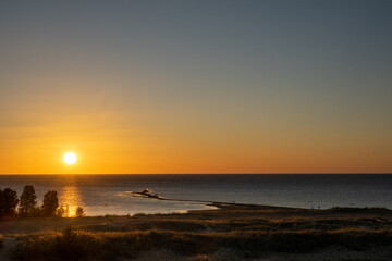 Fototapeta premium Beaches and dunes of Hiekkäsärki beach in Kalajoki, Finland, during sunset