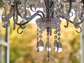 Closeup of a reflecting crystal chandelier.