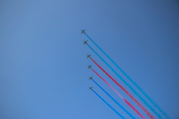 F 16 military airplanes. Turkish Stars at blue sky. Performance of the Turkish aerobatic team at the air show.