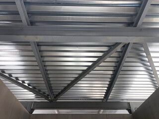 Profiled stainless steel sheets and beams and girders. Metal ceiling structures