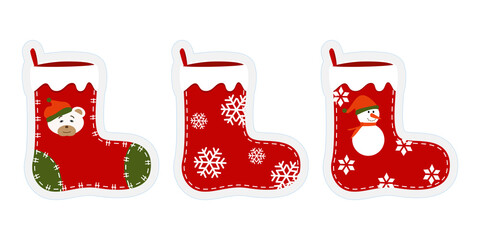 Three Christmas stockings with funny drawings. Stickers, cliparts for xmas. Red, green socks with  snowman, snowflakes, polar bear in hat. Hanging stockings isolated on white background. Vector