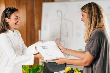 Functional Medicine Practitioner Giving Personal Health Report to the Patient