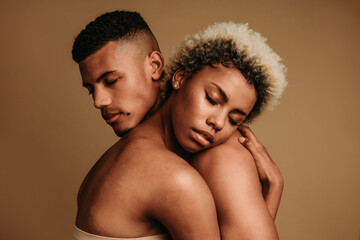 African american couple hugging
