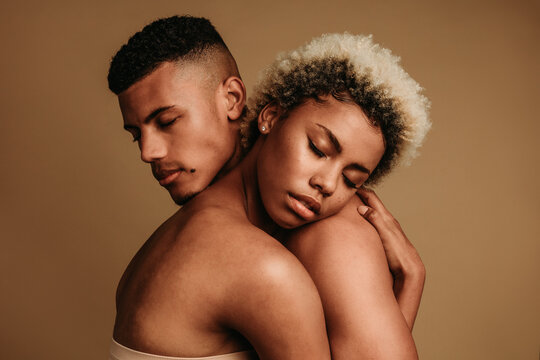 African american couple hugging