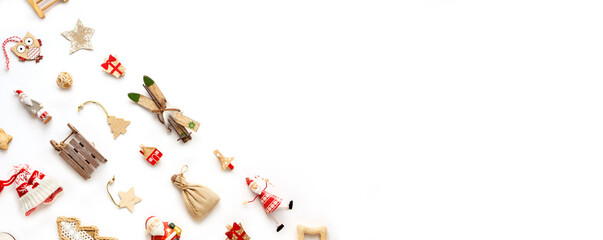 Christmas decoration knolling with zero waste toys. Wooden skis, stars, holiday clothespins. Reusable sustainable recycled decor. Eco friendly new year. Flat lay, copy space, banner. Christmas card