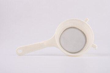 Plastic sieve isolate in white background.