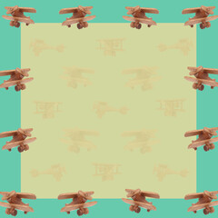 Trendy pattern wooden plane toys concept text frame background