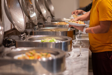 several food on buffet line catering