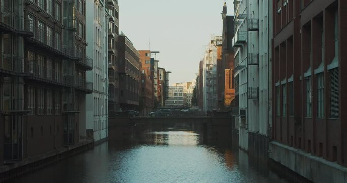 Beautiful buildings and river channels with bridges and cars in Hamburg. Germany.