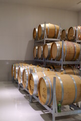 Blurred image of barrels and equipment in a clean wine factory