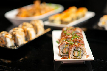Grilled wagyu roll with teriyaki sauce in selective focus