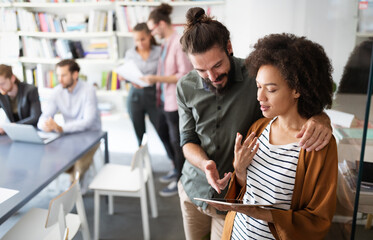 Group of people in a business meeting discussing ideas in office