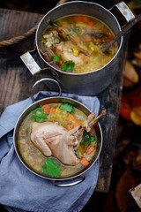 Autumn quail soup with bulgur.style rustic