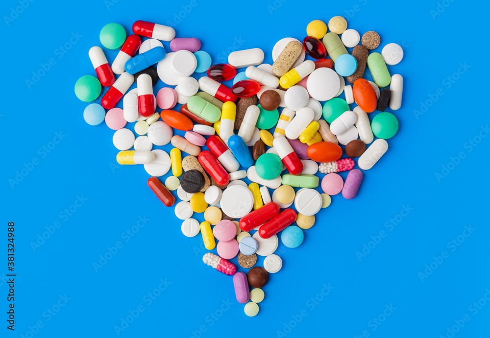 Poster heart made of pills - medical background