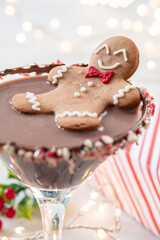 Drunken Gingerbread cookie man in a Christmas cocktail