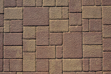 Sidewalk tiles were photographed in sliding light