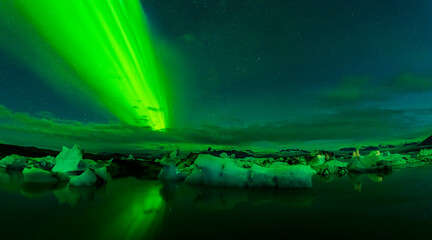 Fototapeta na wymiar Aurora above Ice floe in glacier lake, Jökulsarlon, Iceland
