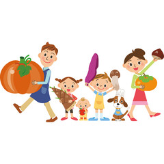 秋の食材を持つ家族