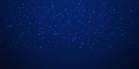 Sparse glowing snow Christmas background. Subtle f