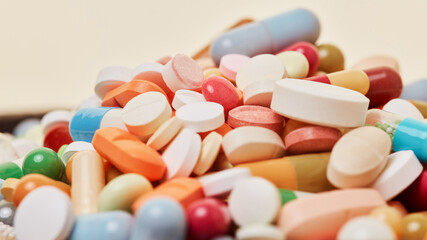 Lots of colorful medicines drugs in a heap