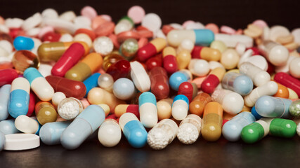 Colorful pills and medicines drugs in a heap