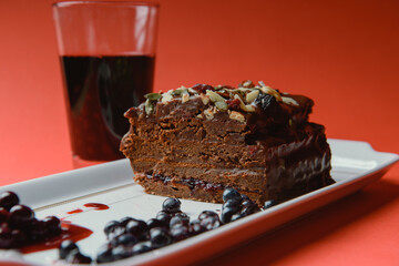 Chocolate cake with raisins lies on the table