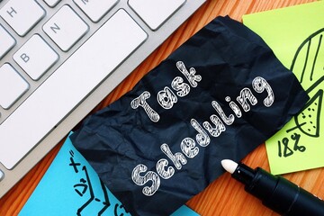 Business concept meaning Task Scheduling with sign on the page.