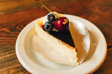 Basque Burnt Cheesecake served on a small white dish.