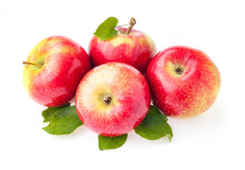 red apples with green leaves isolated on white background.