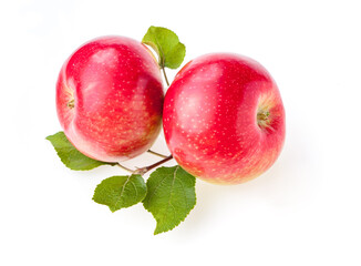 Two ripe red apples with leaf isolated on white background
