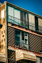 Fototapeta na wymiar View of the facade of a modern building in the streets of Tel Aviv in Israel