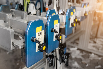 Many ski snowboard storage locker coin cells at peak entrance of station of cabin gondola ski lift at mountain alpine luxury austrian winter resort. Comfort service and facilities for tourists skiers