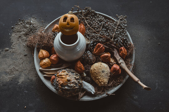 Fall stilife with balancing pumpkin