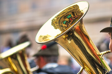 Obraz na płótnie Canvas Bass tuba in an alpine fanfare during a military ceremony parade